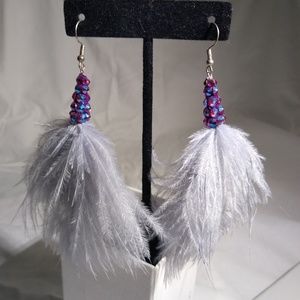 Swarovski and feather earrings